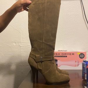 Brown 4 in heeled boots.